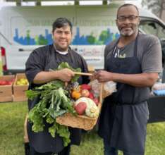Two chefs at the Mobile Market