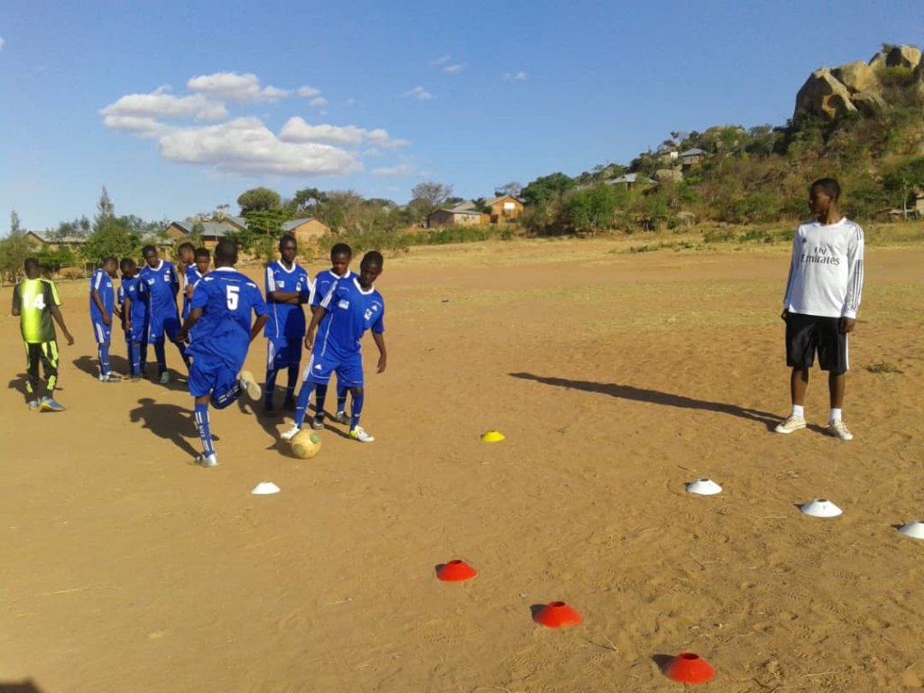 Engage 2000 male and female students in sports