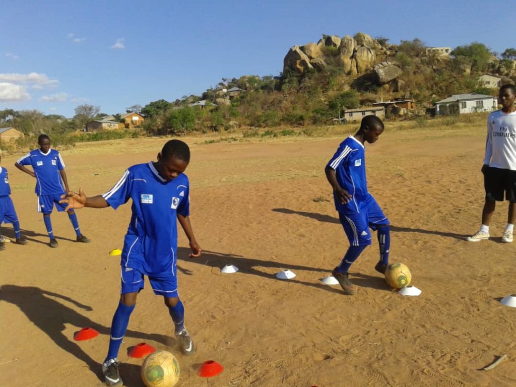 Engage 2000 male and female students in sports