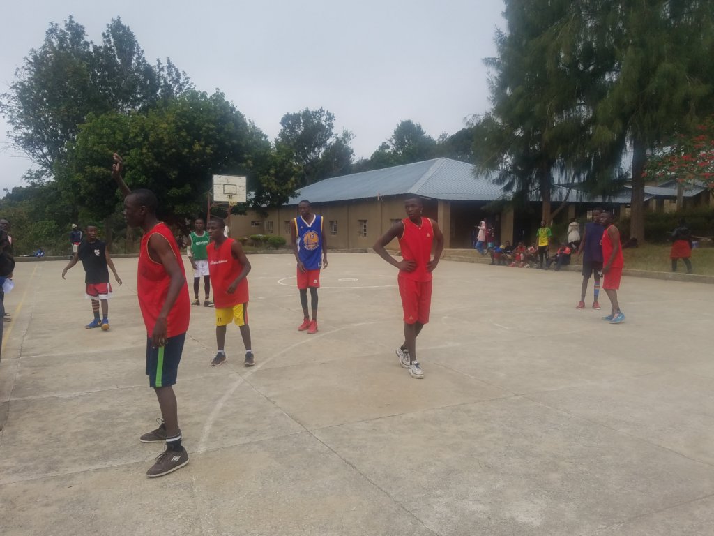 Engage 2000 male and female students in sports