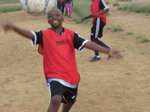 Engage 2000 male and female students in sports