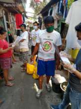 In  Philippines, local workers delivering supplies