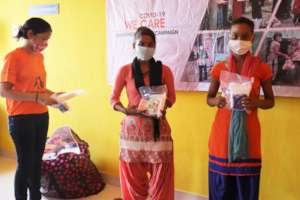 Girls with hygiene kits