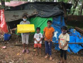 Tarpaulin sheets to slum dwellers