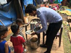 our community worker serving food