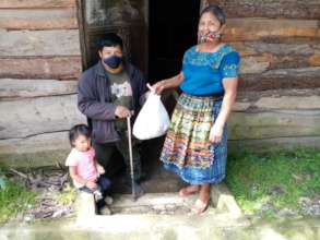 Man with disability receiving pantry supplies