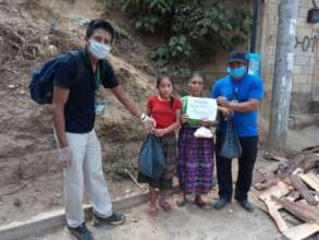 Family receiving pantry supplies