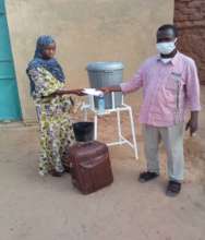 Distributing masks so students can attend school