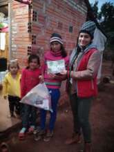 Fundacion Paraguaya's staff delivering donations