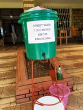 Community hand washing container