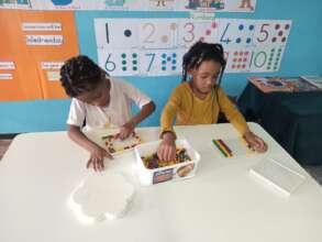 Children playing, immersed in "numeracy"