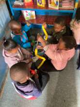 Children learning in a shack school