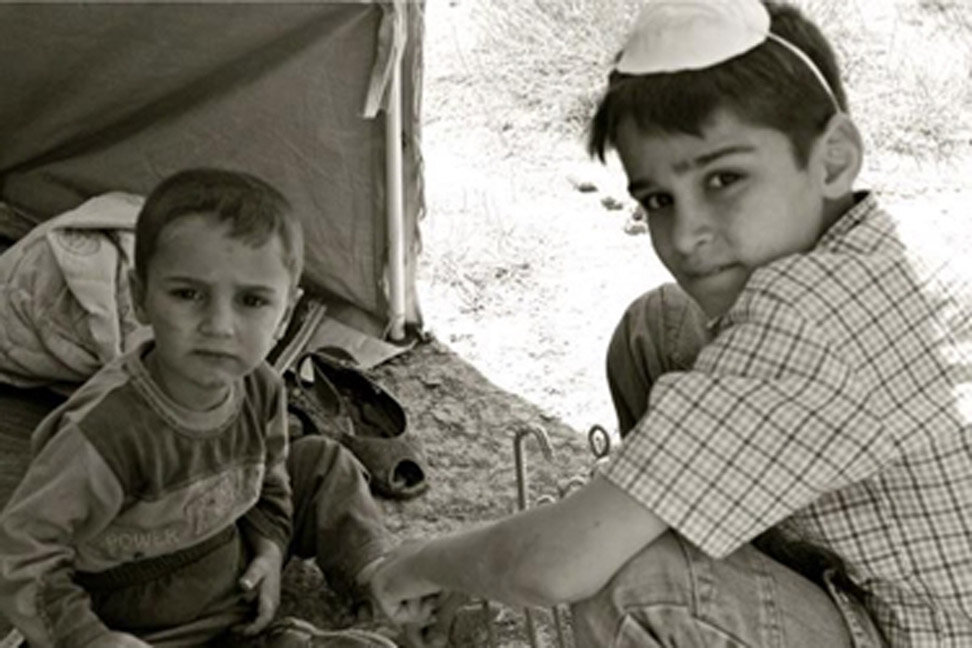 Help Avoid a COVID-19 Explosion Among Refugees
