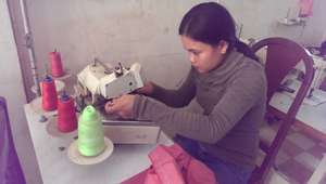 Chantha Learns to Sew!