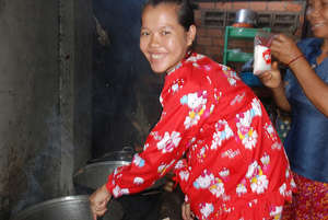 Srey Mach, helping at the restaurant