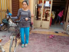Muon with her bike provided by LO