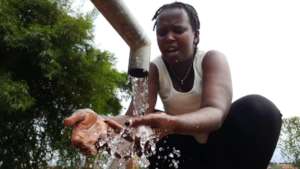 Louise washing her hands