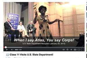 Cleopatra (Zimbabwe) leads State Department rally.