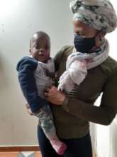 Mama Tumi with one of her little loves