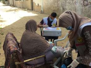 Mobile health team does check-up for patients
