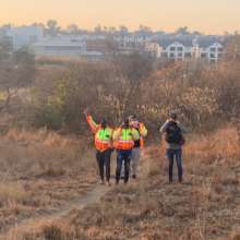 Residents inspecting the area after cleanup