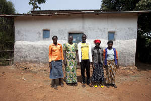Verdiane at home, reunited with her family