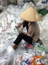 Sorting through plastic waste, Vietnam