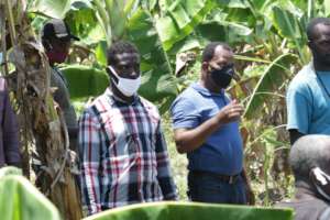 Steve A. Mathieu, SAO COO visiting the farmers