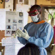 Training health workers on how to apply PPE