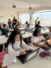 Alumni in computer classes at WPDI