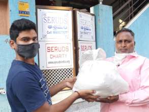 Helping Poor migrant worker with food provisions