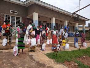 Ndera locals at food aid collection point near CM