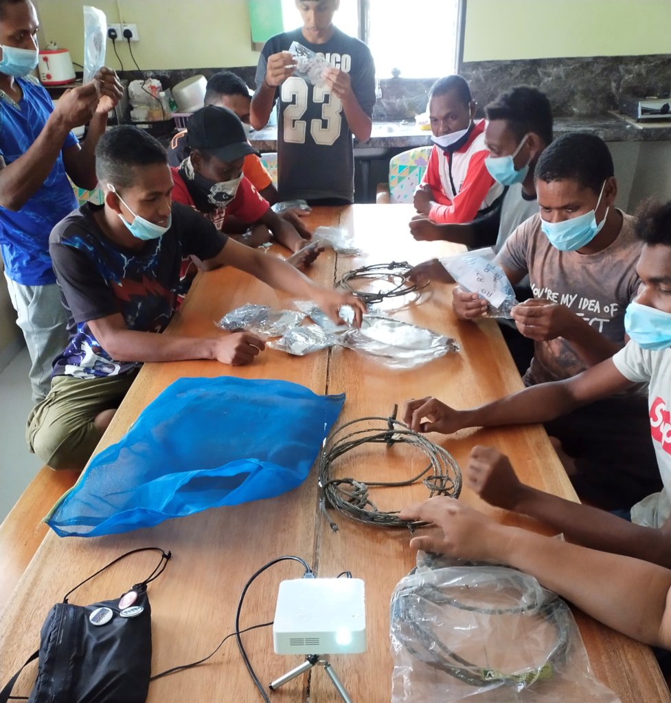 Rangers learning about snares from authorities