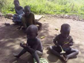 Children enjoying sunflower seeds