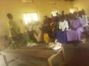 Facilitator explaining the uses of the foods