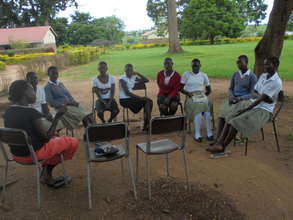 Teacher and girls during group mentorship