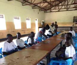 A mentoring meeting with beneficiaries.
