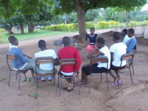 A mentoring meeting with beneficiaries.
