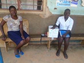 Girls at Teachers College receiving sanitary pads