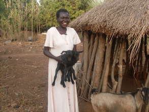 Group member with baby goat