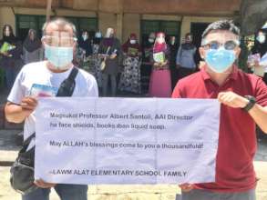 Face shields, masks, and liquid soap help teachers