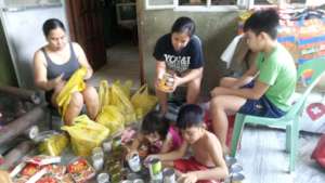 AAI volunteers make Care Packages for kids in need