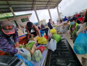 Distributing food in Covid isolated village