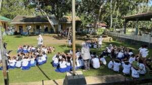 Students assemble outside of school