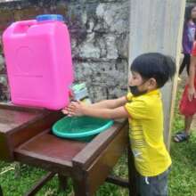 mini-hygiene stations in front of classrooms