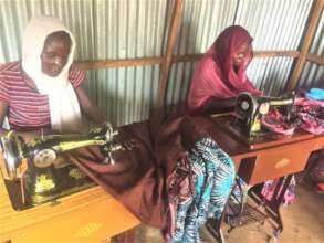 Pictures of follow up visit on IDP camp
