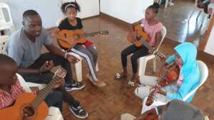 Holiday programme Guitar Class with Teacher George