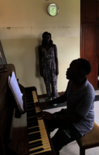 Immaculate sings in her class