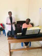 Joy in a singing lesson with Teacher Francis