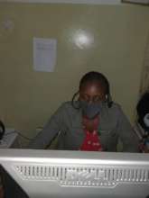 Sheilla Working on an administrative report